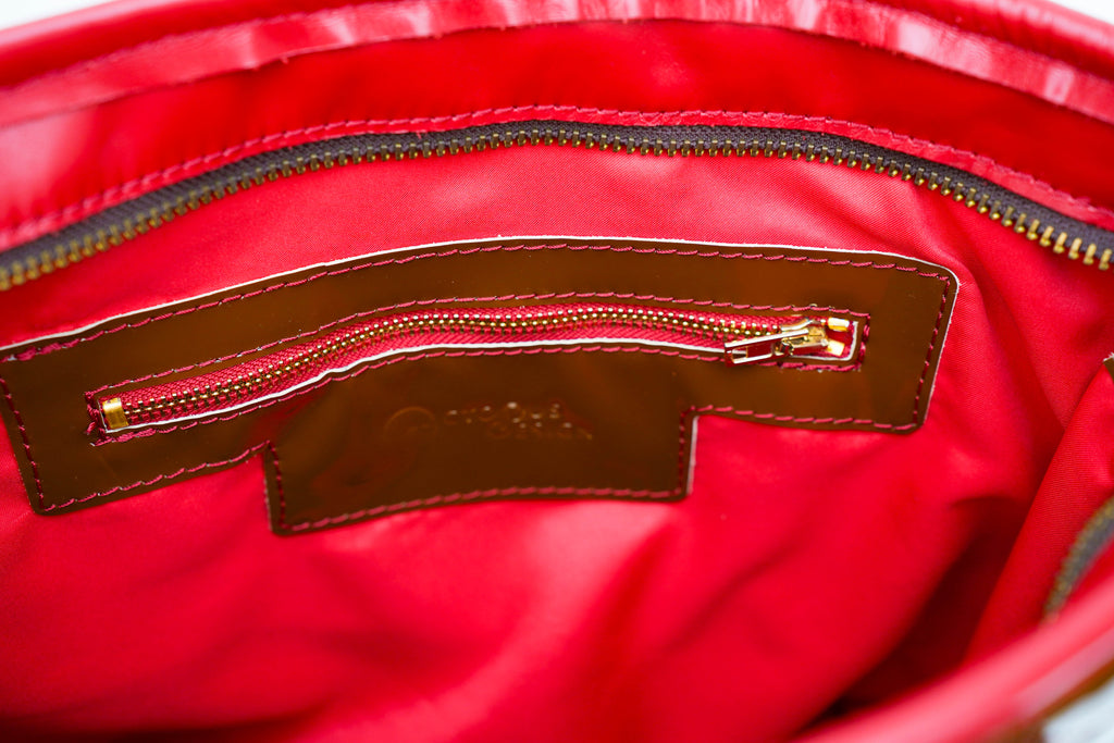 Sac designo                                     Bi- ton