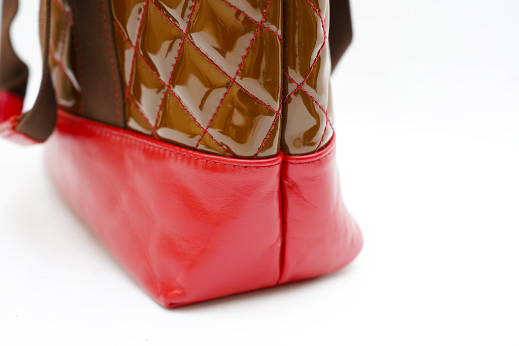 Sac designo                                     Bi- ton