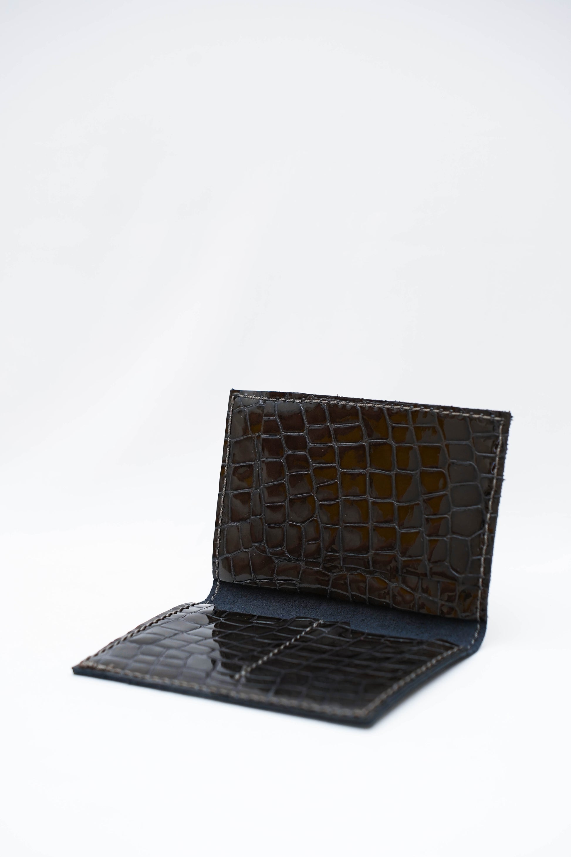 Portefeuille  Brun terre                      Cuir gaufré vernis