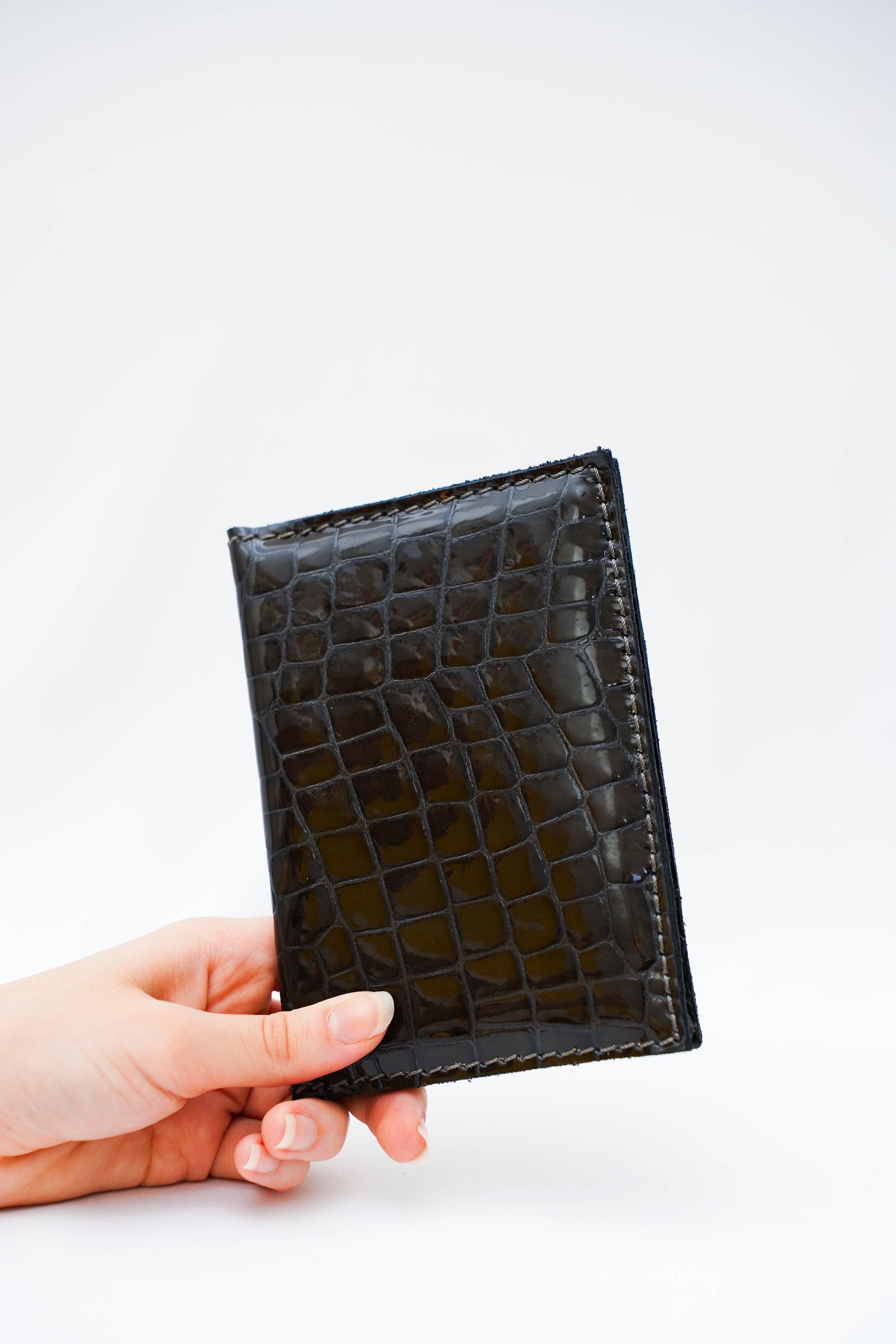 Portefeuille  Brun terre                      Cuir gaufré vernis