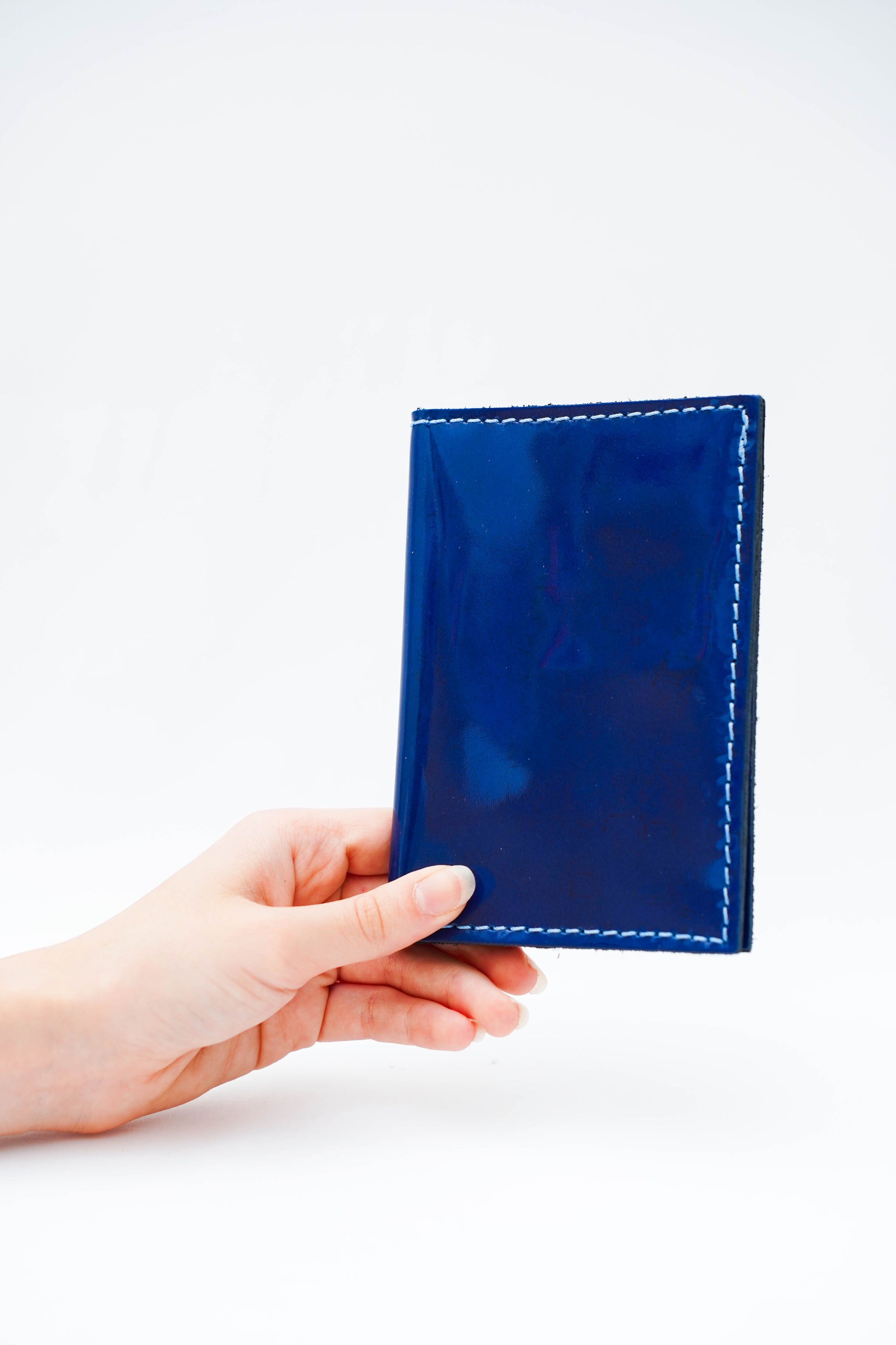 Portefeuille                                      Cuir bleu vernis